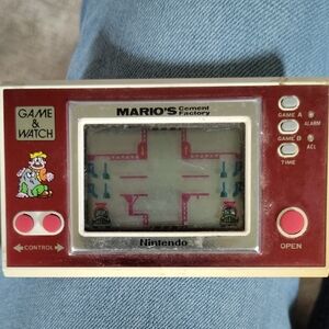 Nintendo Red and White Handheld Console